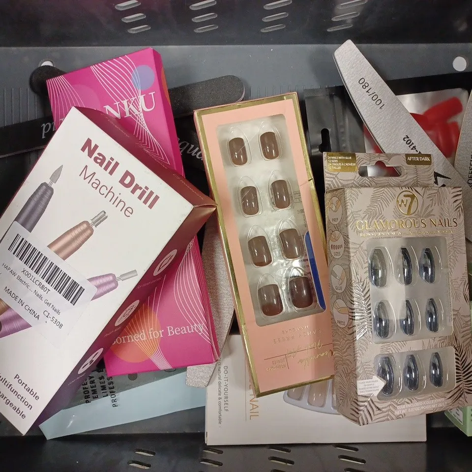 APPROXIMATELY 10 NAIL PRODUCTS TO INCLUDE FALSE NAILS, NAIL DRILL MACHINE, AND NAIL BRUSHES
