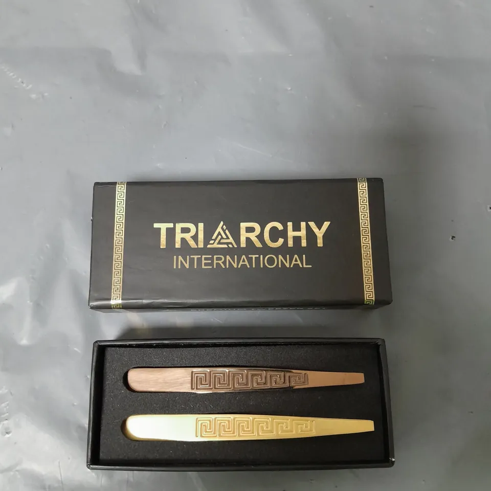 APPROXIMATELY 15 TRIARCHY INTERNATION PREMIUM TWEEZER SET