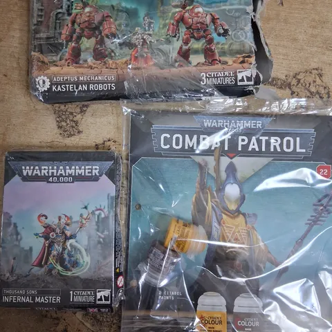 THREE ASSORTED WARHAMMER 40,000 PRODUCTS TO INCLUDE; COMBAT PATROL, THOUSAND SONS INFERNAL MASTER AND ADEPTUS MECHANICUS KASTELAN ROBOTS