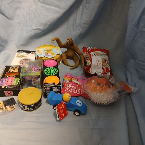 LARGE QUANTITY OF ASSORTED TOYS AND ACCESSORIES TO INCLUDE; THE MONSTERS COCA COLA, SCRUNCHEMS MINI NEON SQUISH BALLS, LEGO, LOVE DIANA POCKET WATCH MYSTERY BOW, PULL BACK HOT ROD AND MYSTERY DUMPLING