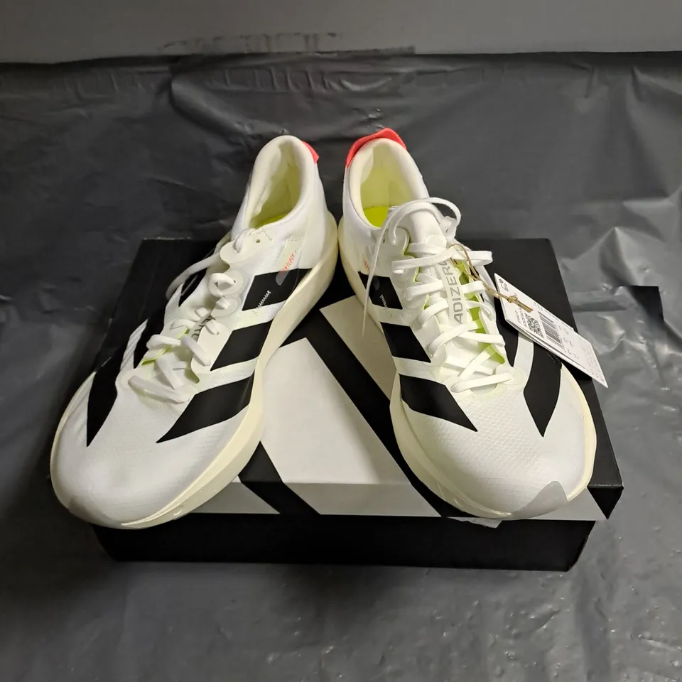 BOXED PAIR OF ADIDAS ADIZERO ADIOS 9 RUNNING SHOES IN WHITE/BLACK SIZE UK 9.5