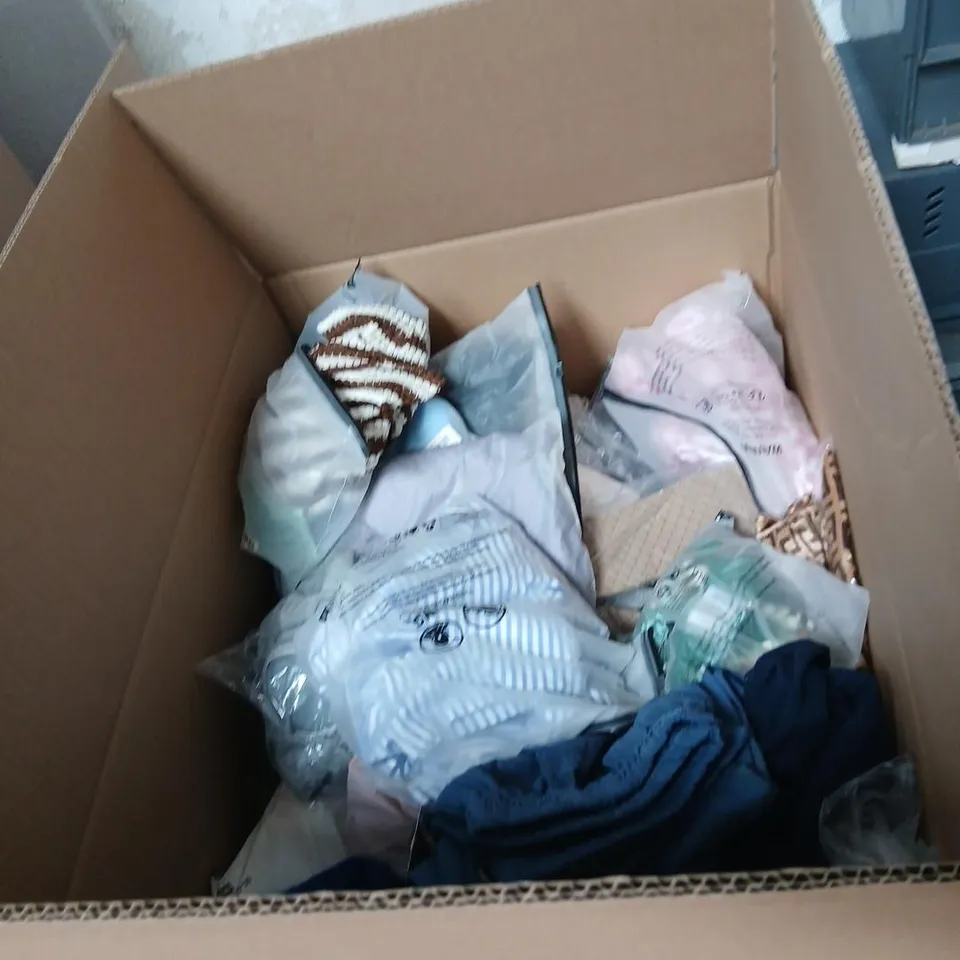 LARGE QUANTITY OF ASSORTED CLOTHING AND ACCESSORIES TO INCLUDE; PANTS, RAIN COAT AND SLIPPERS
