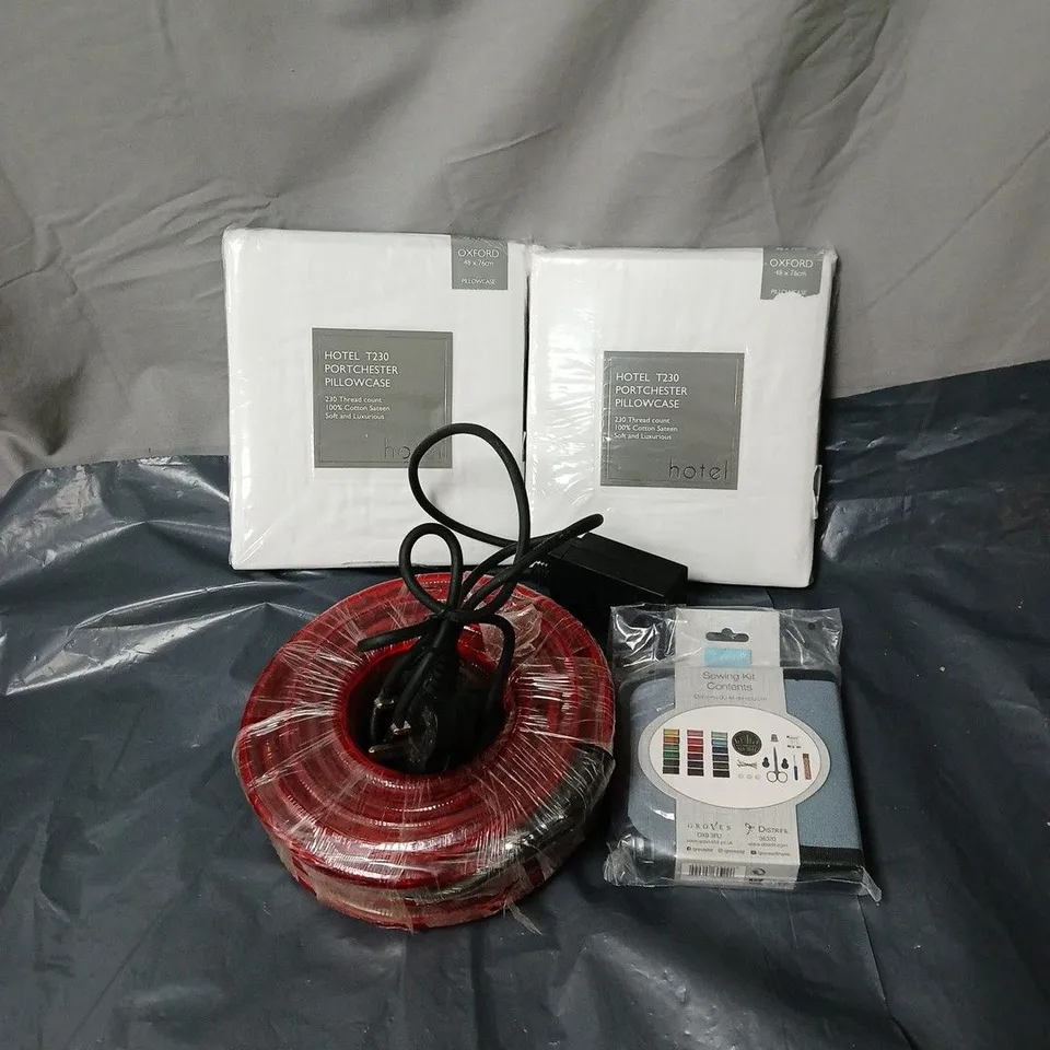 BOX OF APPROXIMATELY 15 ASSORTED HOUSEHOLD ITEMS TO INCLUDE PILLOWCASES, EXTENSION PLUG, SEWING KIT ETC