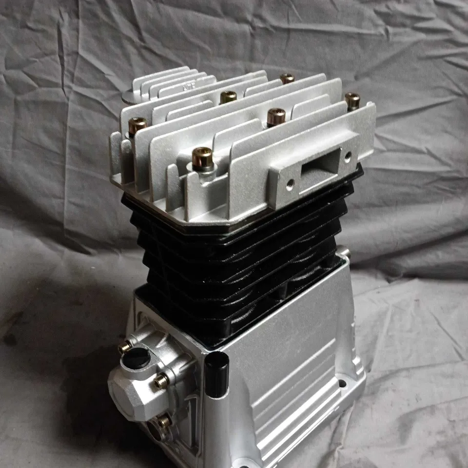 FINNED ALUMINIUM ENGINE COMPONENT ON INTEGRAL BASE - MODEL UNSPECIFIED