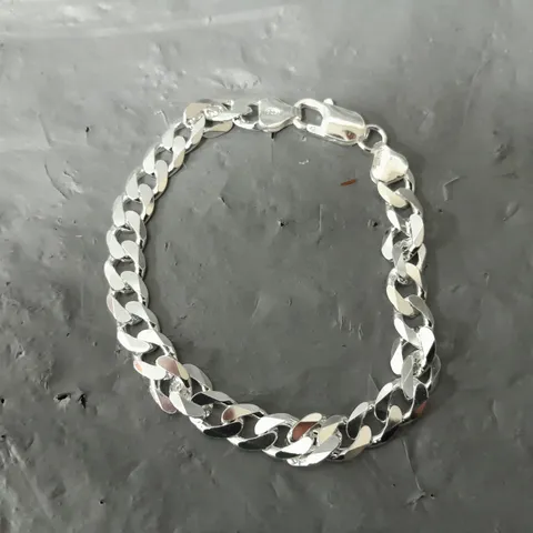 THE SILVER COLLECTION STERLING SILVER 1OZ SOLID DIAMOND CUT CURB BRACELET