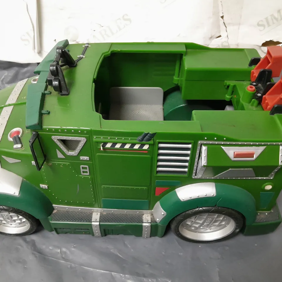 LOT OF ASSORTED TOYS INCLUDES 4 ACTION MAN FIGURINES AND TMNT VEHICLE