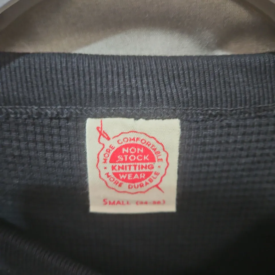 Plain black crew-neck knit jumper, UK Small (34-36) .