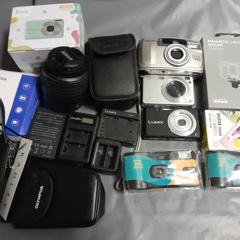 LOT OF APPROXIMATELY 18 ASSORTED CAMERAS AND ACCESSORIES TO INCLUDE SONY CYBER-SHOT. RADLEY CASE AND NIKON LENS