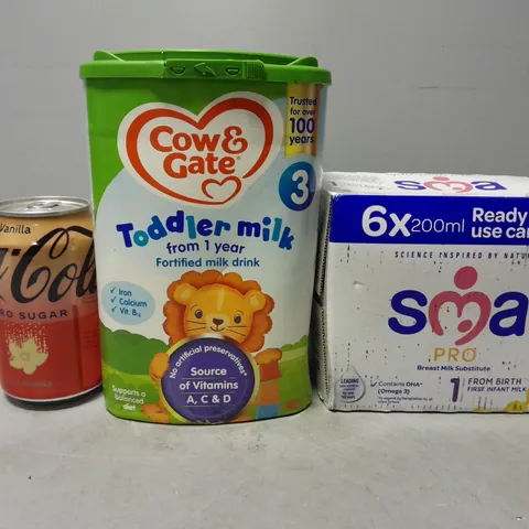 TOTE OF APPROXIMATELY 4 ASSORTED FOOD ITEMS TO INCLUDE - SMA PRO BREAST MILK SUBSTITUTE  , COW & GATE TODDLER MILK , COCOA COLA ZERO SUGAR VANILLA 