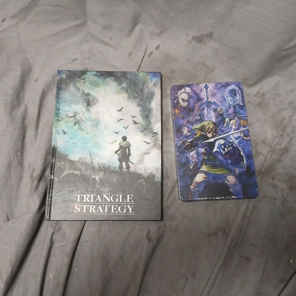 APPROXIMATELY 50 ASSORTED ITEMS TO INCLUDE NINTENDO SWITCH TRIANGLE STRATEGY BOOK & LEGEND OF ZELDA SWORD HD STEELBOOKS - COLLECTION ONLY
