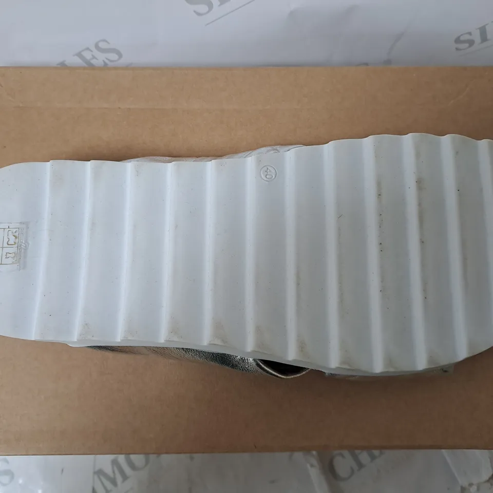 boxed ADESSO sandles in sliver size 7 