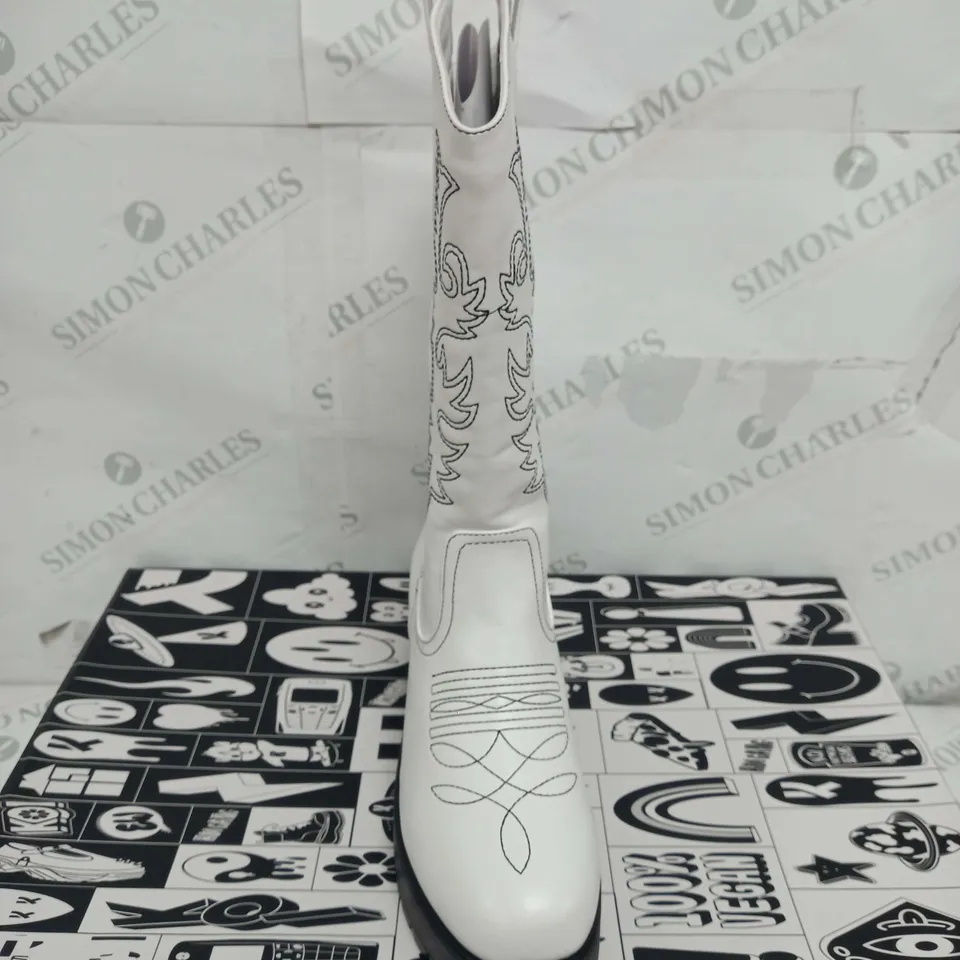 BOXED PAIR OF KOI FOOTWEAR WINTU LONG CHUNKY WESTERN BOOTS IN WHITE - SIZE 7