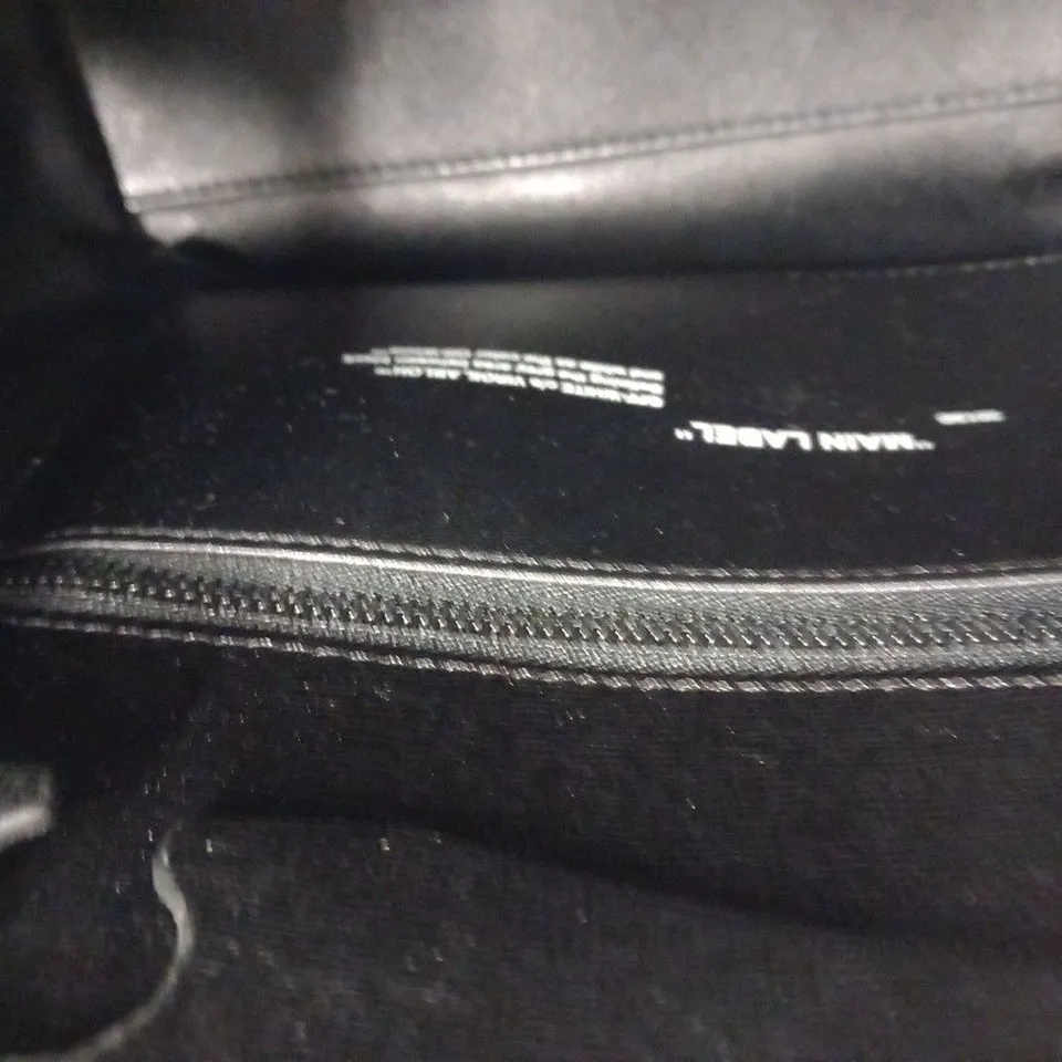 OFF-WHITE  BLACK AND WHITE CUT FLAP BAG