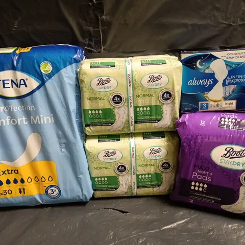 LOT OF 5 ASSORTED MULTI PACKS OF SANITARY PADS INCLUDE BOOTS, TENA AND ALWAYS