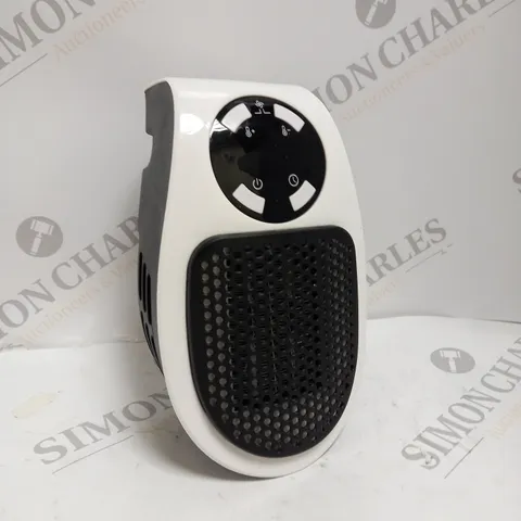 BOXED 500W MINI PLUG IN HEATER 