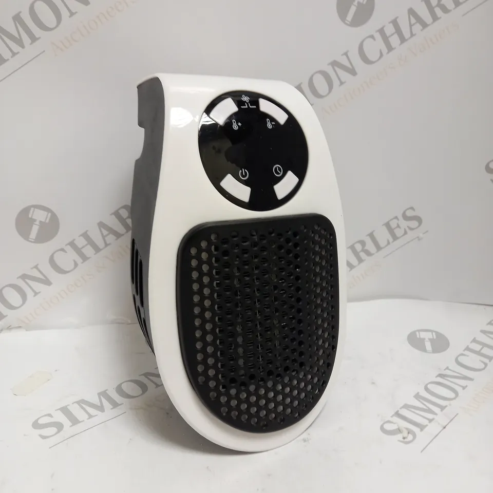 BOXED 500W MINI PLUG IN HEATER