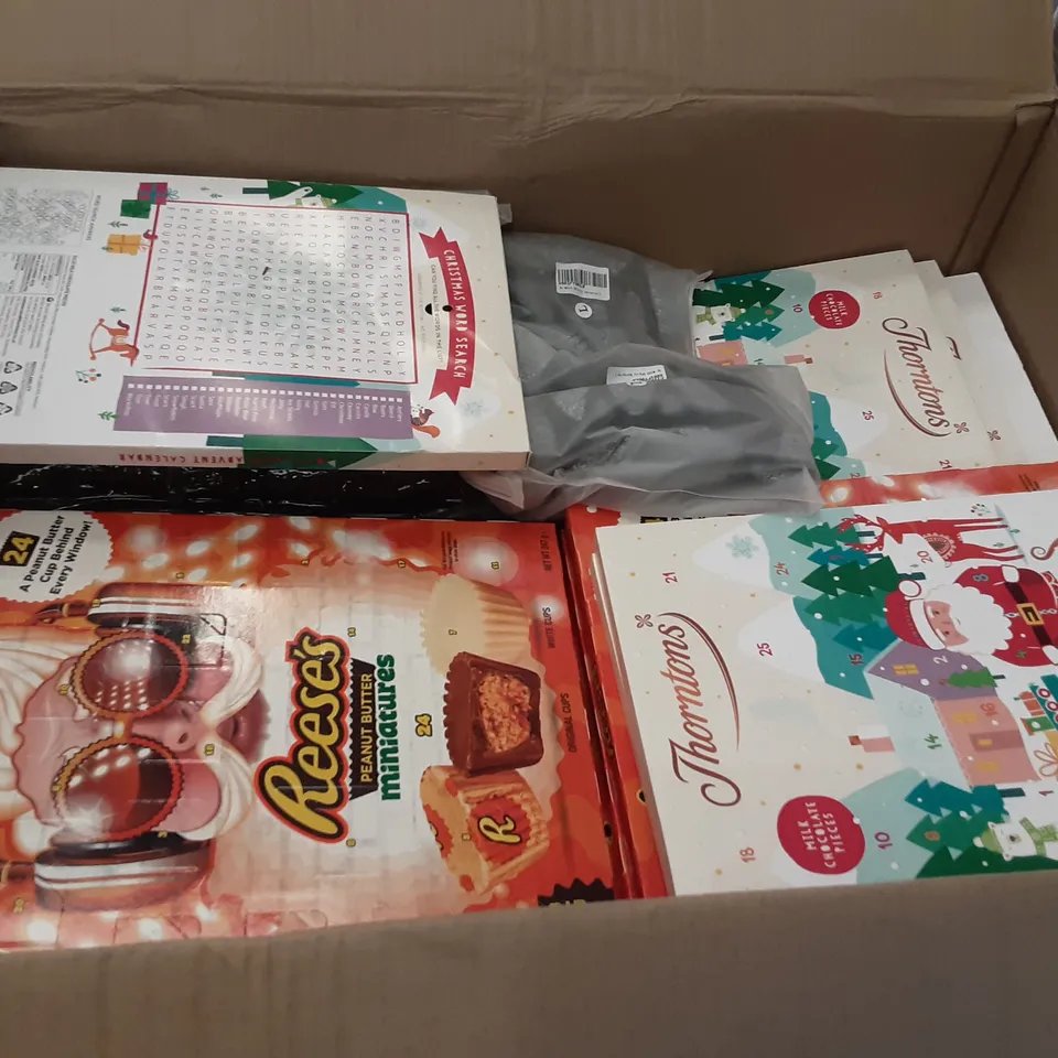 PALLET OF ASSORTED PRODUCTS INCLUDING LINDT TEDDY ADVENT CALENDAR, REESE'S PEANUT BUTTER MINIATURES ADVENT CALENDAR, THORNTONS ADVENT CALENDAR, STAR CHRISTMAS TREE TOPPER, UMBRELLA BAG, PLANT GROW BAG