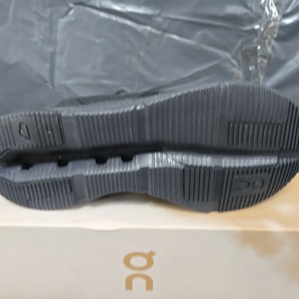 BOXED PAIR OF ON CLOUDNOVA TRAINERS IN BLACK ECLIPSE - UK 8