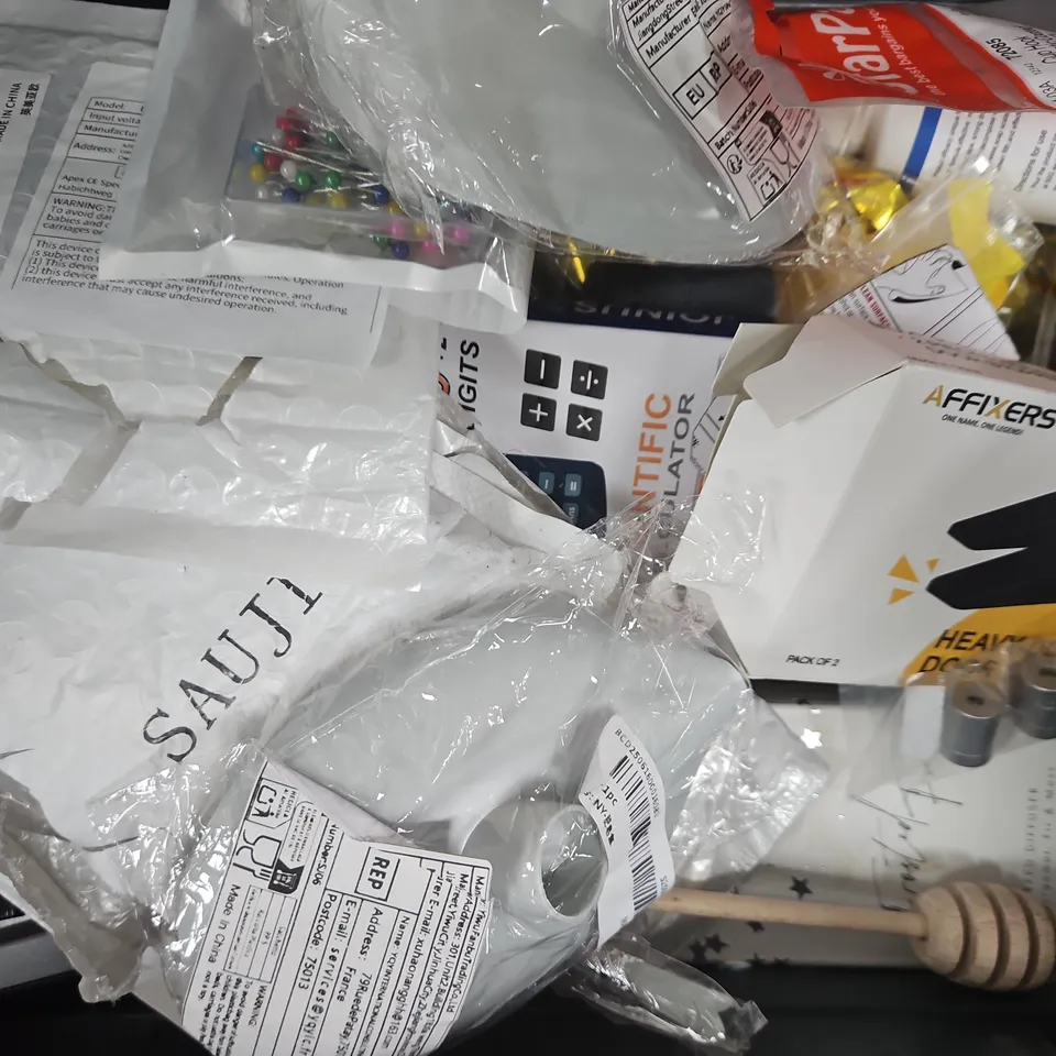 APPROXIMATELY 10 ASSORTED HOUSEHOLD ITEMS TO INCLUDE HEAVY-DUTY DOOR STOPPERS, PENCILS, POWER TOOL LIGHTING LED, ETC
