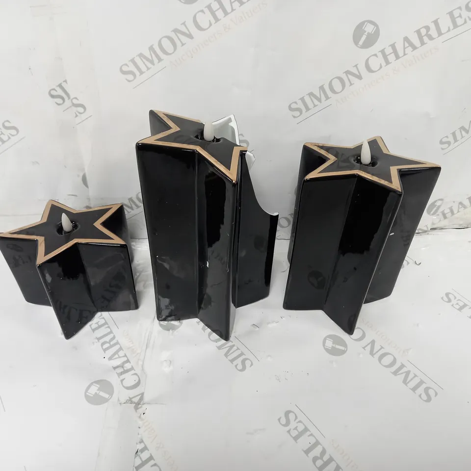 HOME REFLECTIONS PORCELAIN STAR PRE-LIT CANDLES SET OF 3 - BLACK