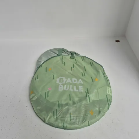 GREEN CIRCULAR BAG WITH POP UP BABY TENT
