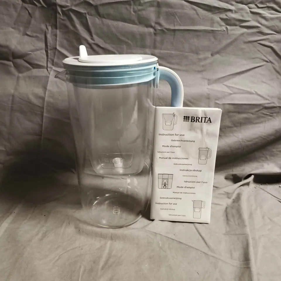 BRITA WATER FILTER PITCHER WITH BLUE/WHITE LID AND INSTRUCTION MANUAL
