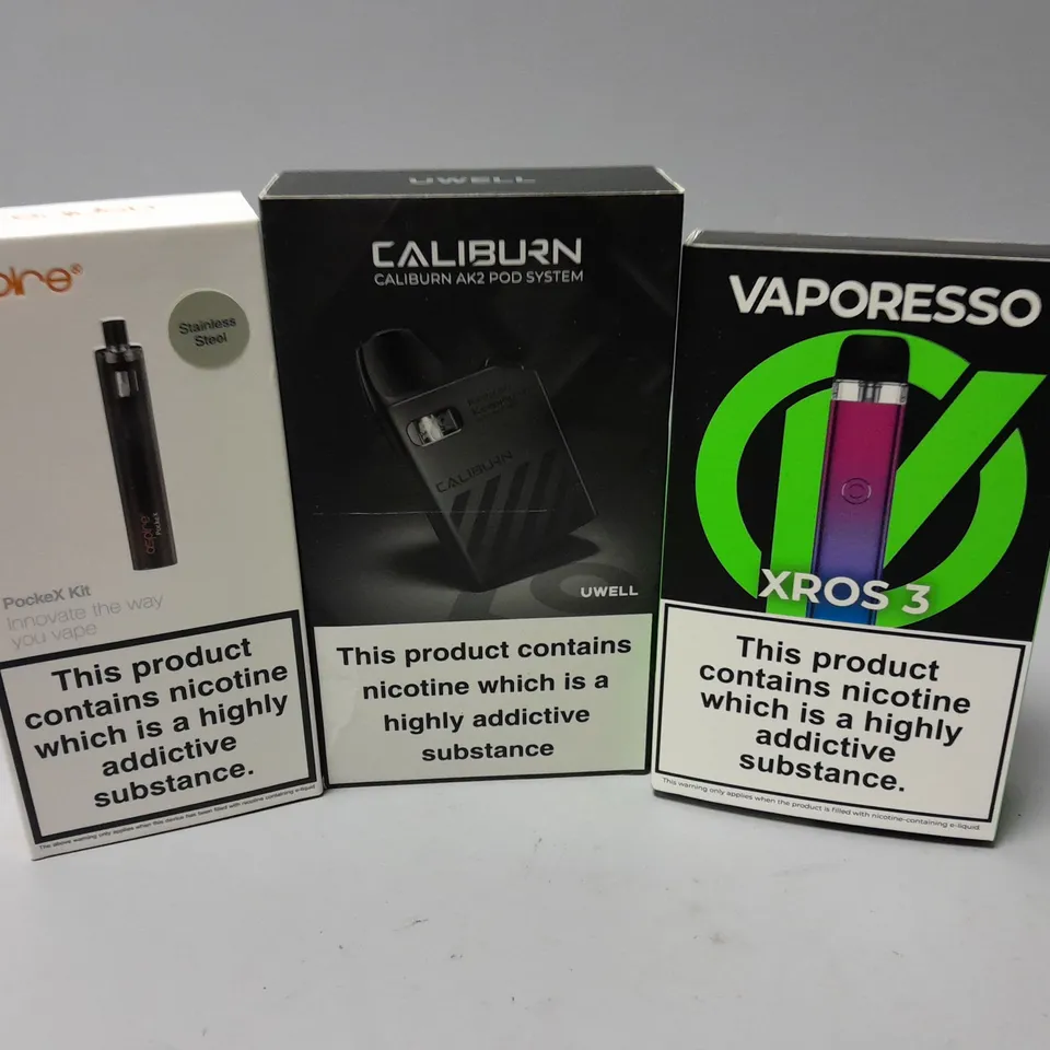 APPROXIMATELY 10 ASSORTED E-CIGS & VAPES TO INCLUDE VAPORESSO XROS 3, CALIBURN AK2 POD SYSTEM, ASPIRE POCKEX KIT, ETC