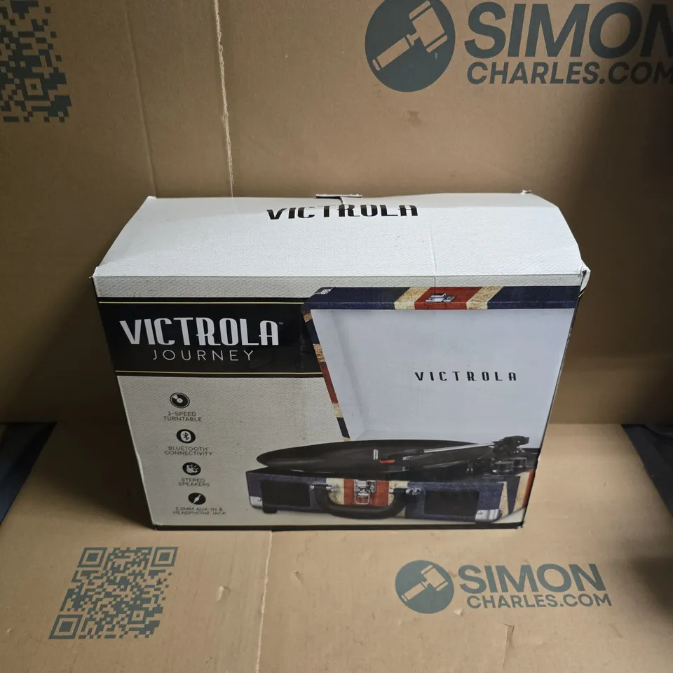 BOXED VICTROLA VSC-550BT TURNTABLE IN BLUE/RED/WHITE