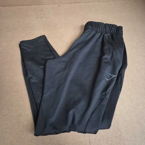 GYMSHARK LOGO TRACKSUIT BOTTOMS IN BLACK - SMALL