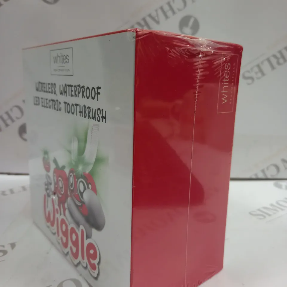 BOXED & SEALED “WIGGLE” CHILDREN'S ELECTRIC TOOTHBRUSH