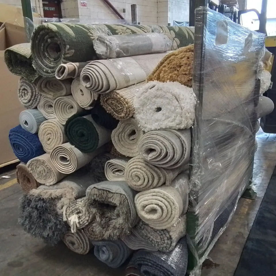 STILLAGE OF APPROXIMATELY 25 QUALITY DESIGNER RUGS