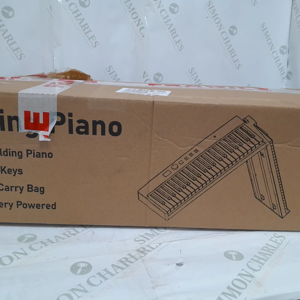 BOXED 88-NOTE FOLDING DIGITAL PIANO RRP £199.99