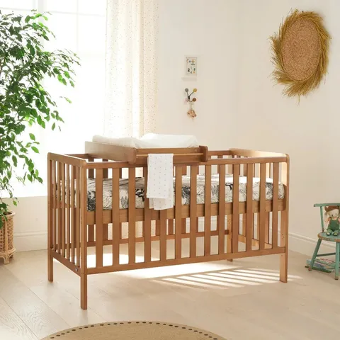 BOXED TUTTI BAMBINI MALMO COT BED WITH COT TOP CHANGER - HONEY OAK