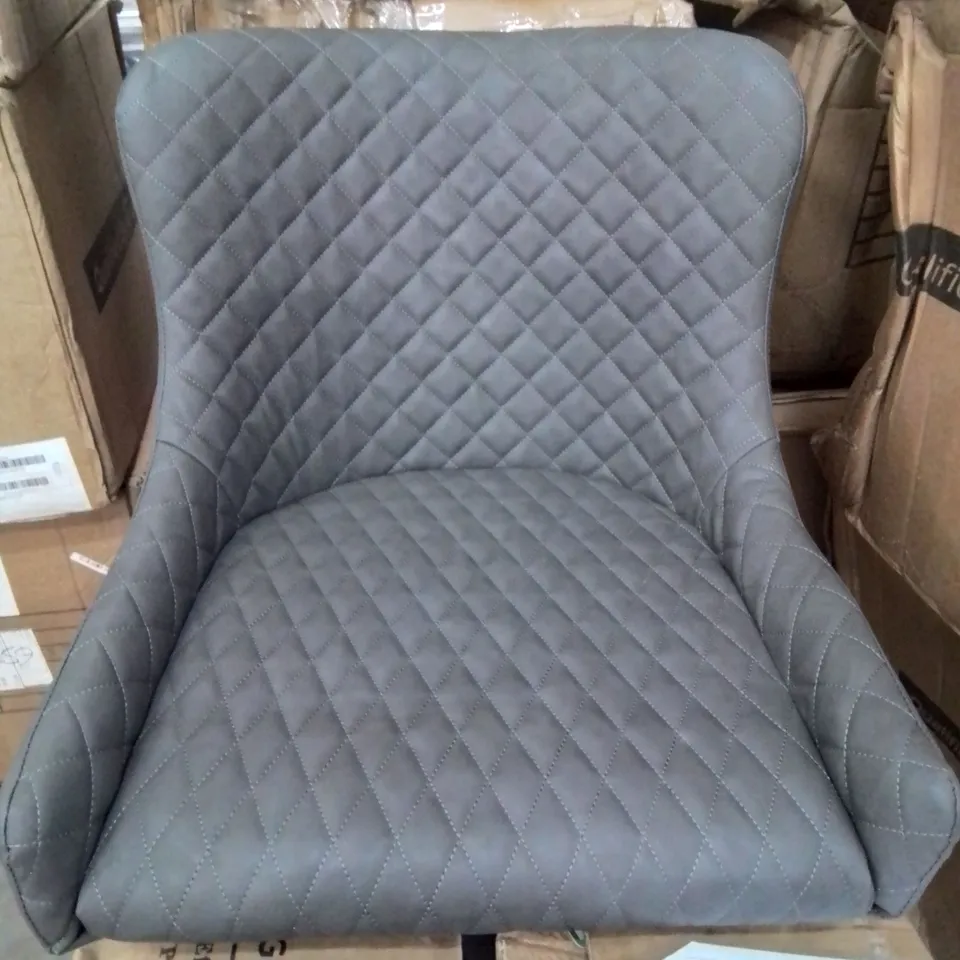 A BOXED PAIR OF GREY FAUX LEATHER UPHOLSTERED DINING CHAIRS