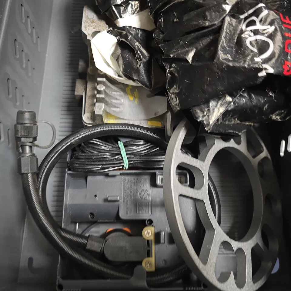 APPROXIMATELY 6 ASSORTED ITEMS TO INCLUDE - WYNN'S COOLING SYSTEM TREATMENT & STOP LEAK , WHEEL ETC
