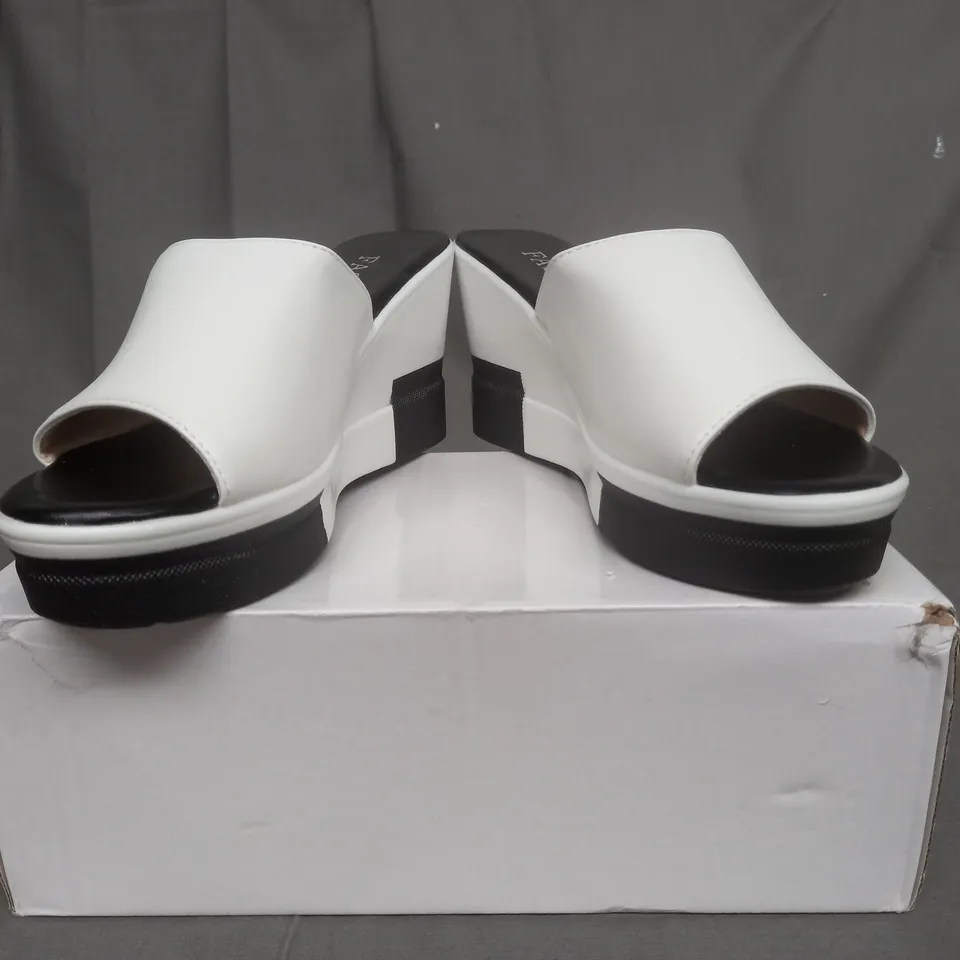 BOXED PAIR OF FASHION NONO SHOES IN BLACK AND WHITE EU SIZE 38