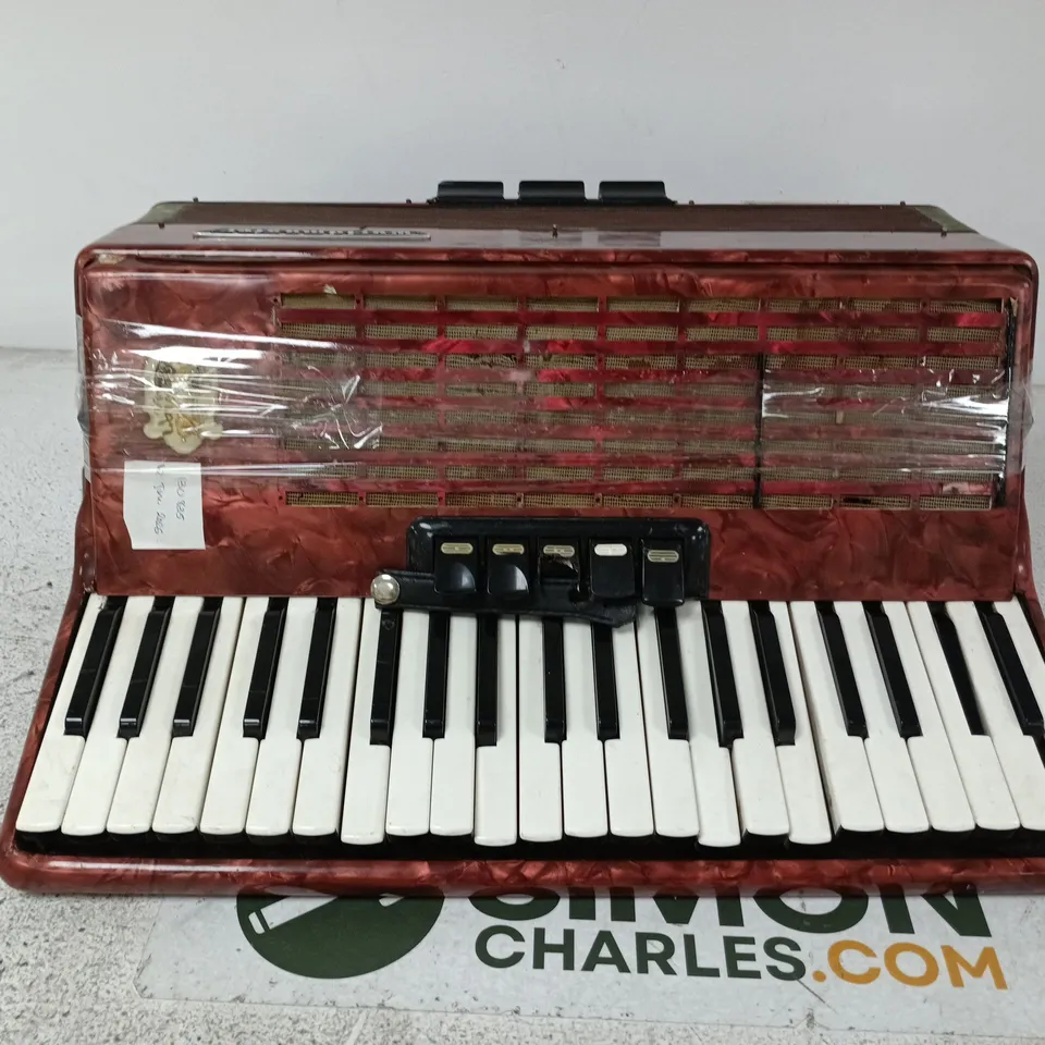 WORLDMASTER STELLA ACCORDION (RED MARBLED CASING) – KEYBOARD & BUTTON MODEL
