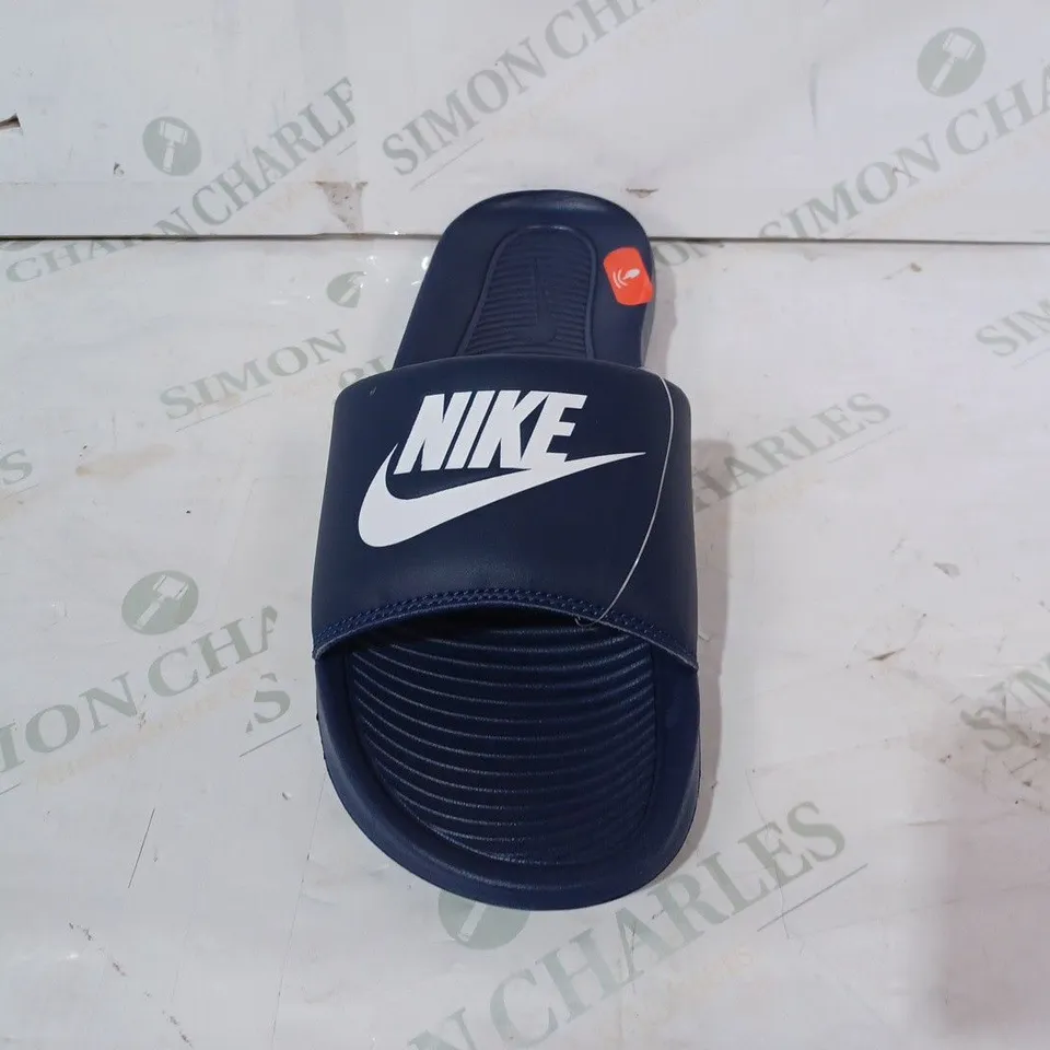 BOXED PAIR OF NIKE SLIDERS IN NAVY UK SIZE 9