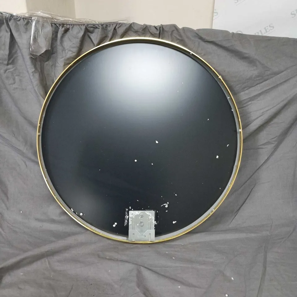 Round wall mirror with brass/gold frame – wall mounted