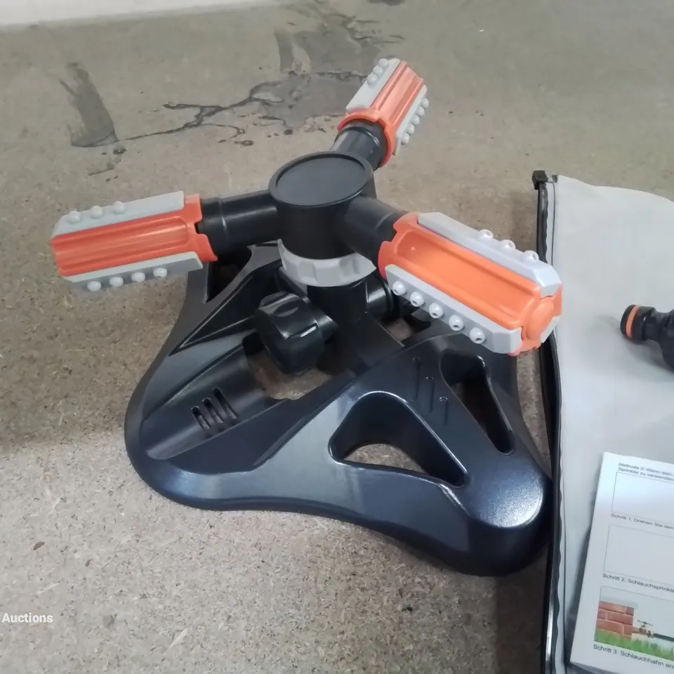 A BOX OF 9 SPRINKLER HOSE ATTACHMENTS