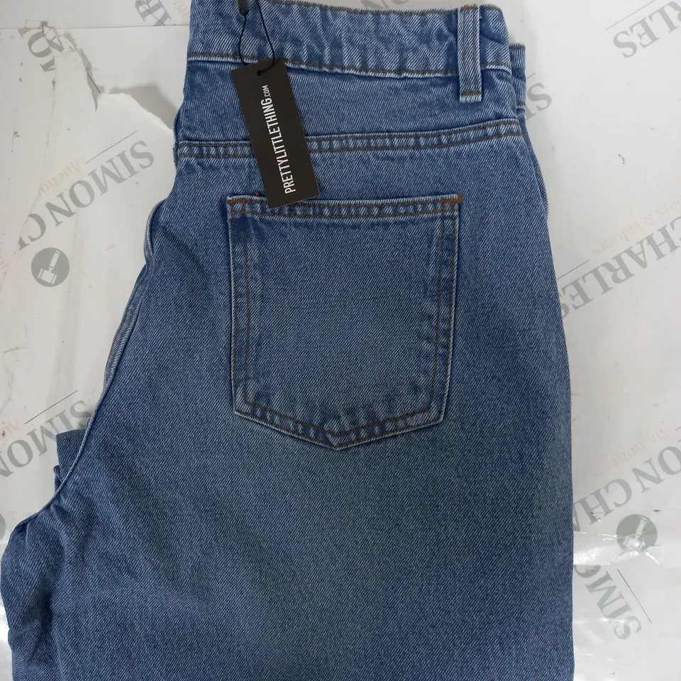 APPROXIMATELY 20 ASSORTED ITEMS TO INCLUDE TOPS AND TROUSERS 