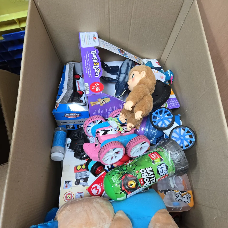 BOX OF APPROXIMATELY 10 ASSORTED CHILDREN'S TOYS INCLUDING ROBO ALIVE DINO DNA, OUT &ABOUT BUBBLE SOLUTION AND TILE TOWN FIRE TRUCK LIGHTS AND SOUNDS TIRE SET