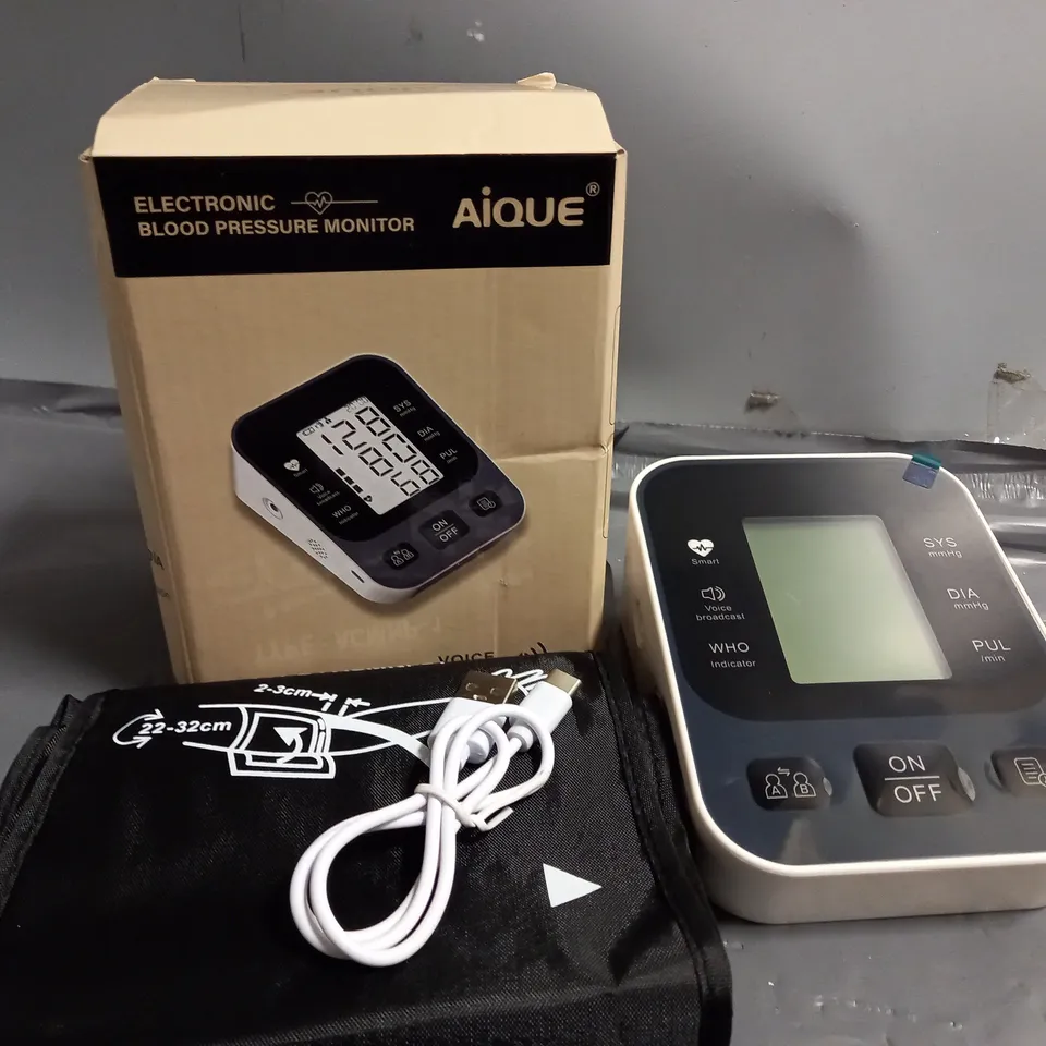 BOXED AIQUE ELECTRONIC BLOOD PRESSURE MONITOR