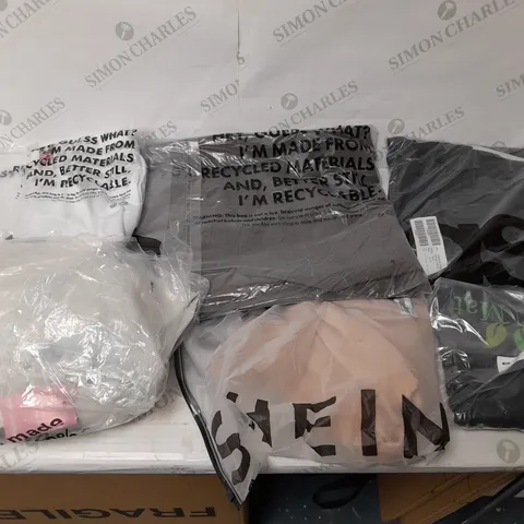 LARGE BOX OF ASSORTED CLOTHING ITEMS IN VARIOUS COLOURS AND SIZES INCLUDING TROUSERS , TOPS AND JUMPERS