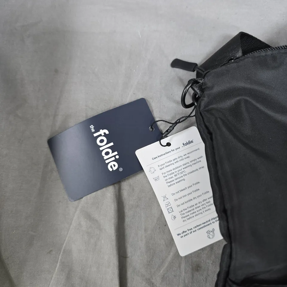 THE FOLDIE BLACK CROSSBODY BAG