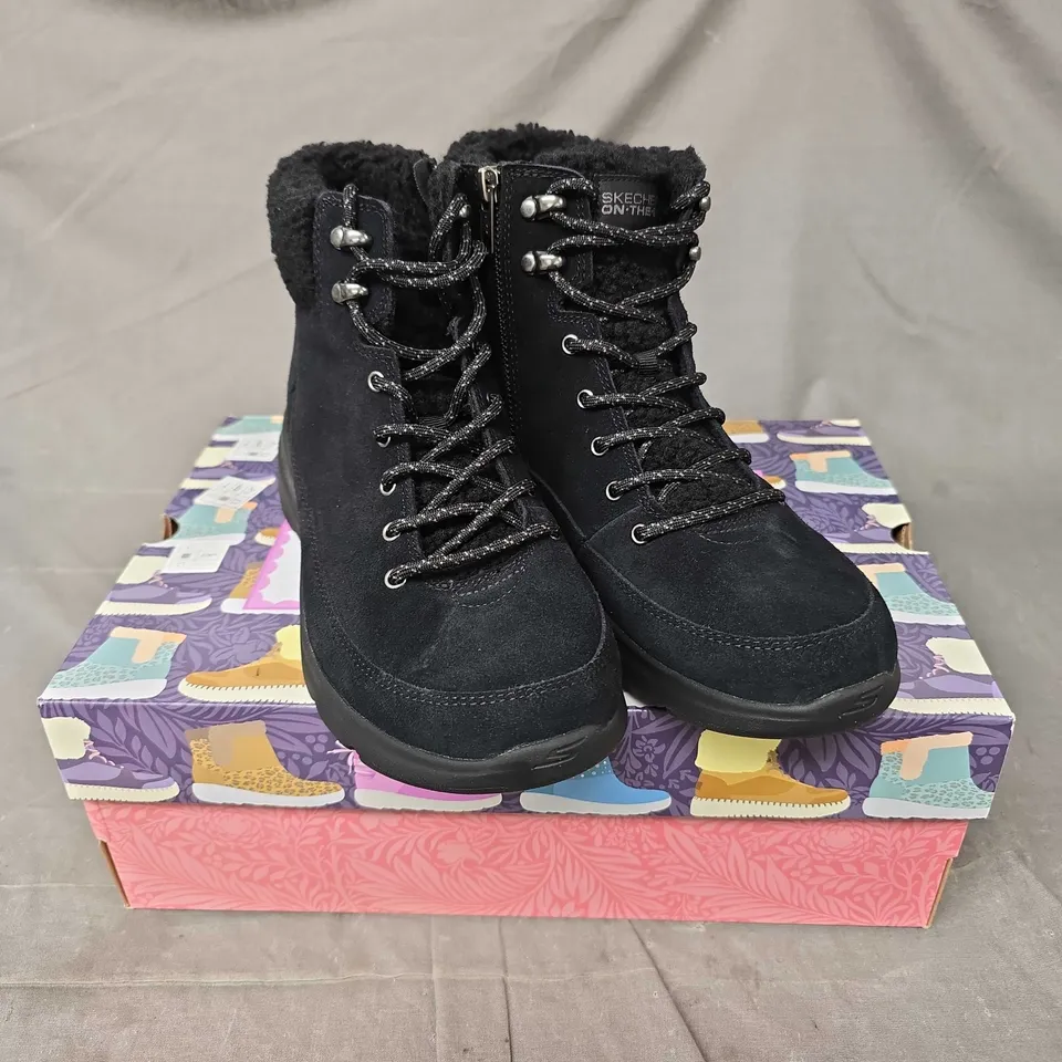 BOXED PAIR OF SKECHERS GO WALK BOOTS IN BLACK - 7