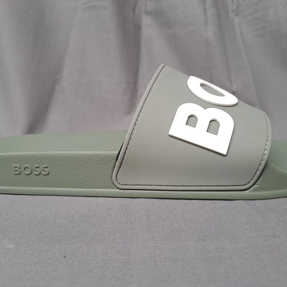 PAIR OF BOSS SLIDERS IN OLIVE GREEN EU SIZE 43