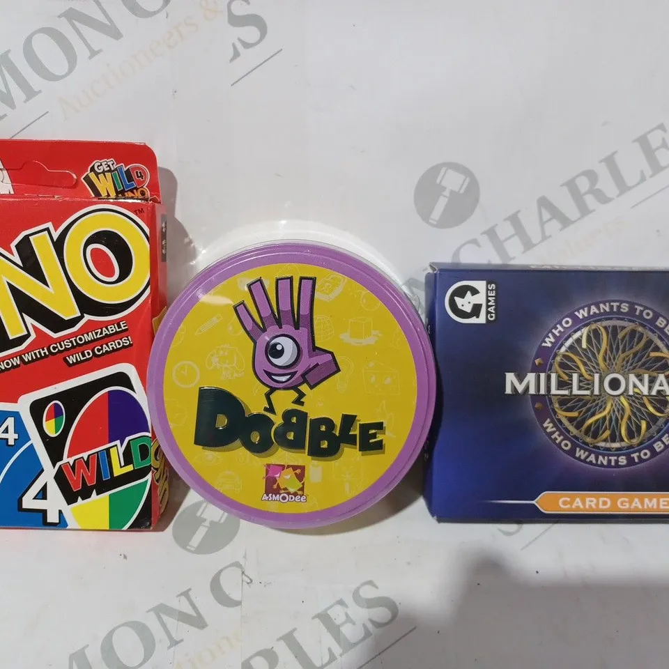 BOX OF APPROXIMATELY 10 ASSORTED TOYS AND GAMES TO INCLUDE WHO WANTS TO BE A MILLIONAIRE, DOBBLE, UNO, ETC