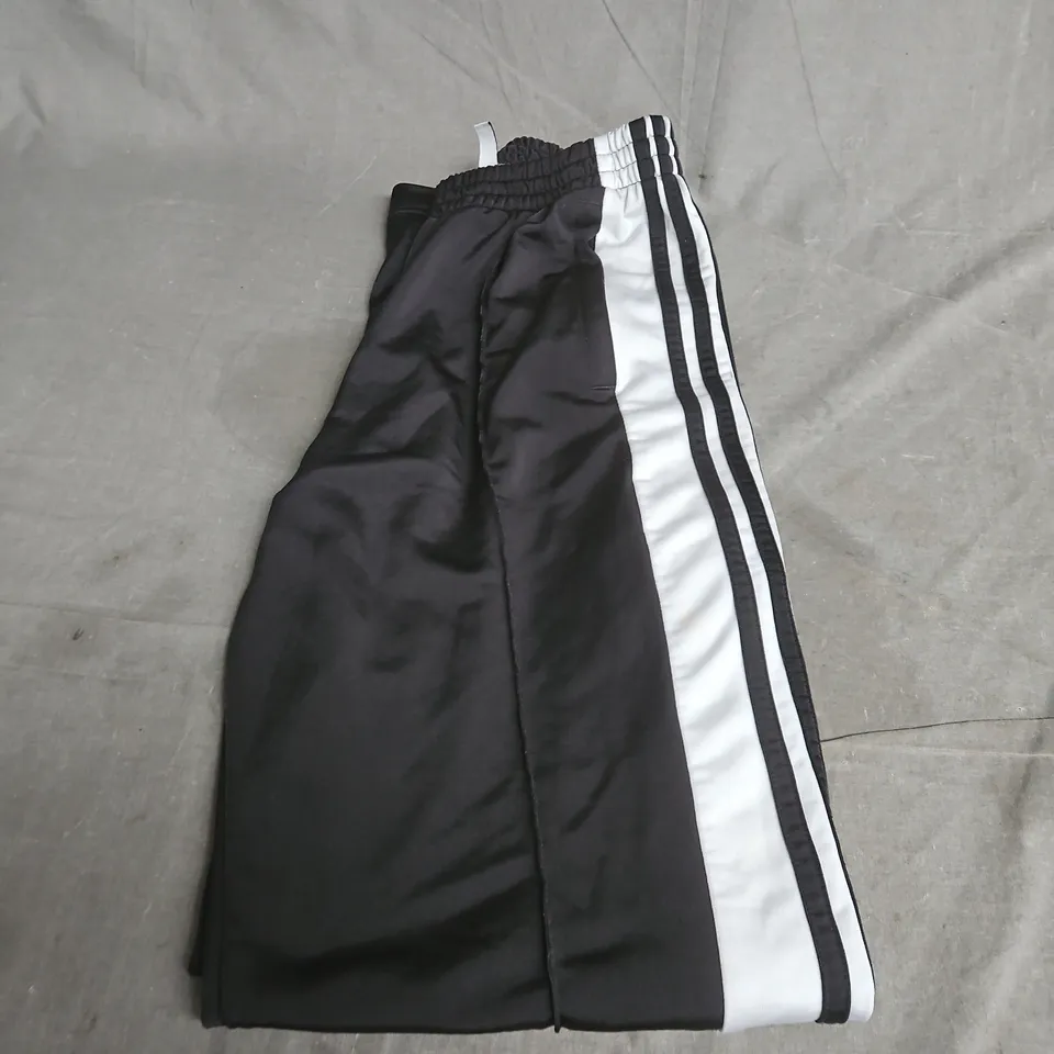 ADIDAS TRACK PANTS – THE BRAND WITH THE THREE STRIPES - SIZE 10