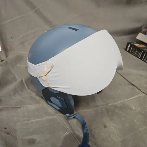 BLUE BICYCLE HELMET WITH WHITE FACE SHIELD ATTACHMENT 